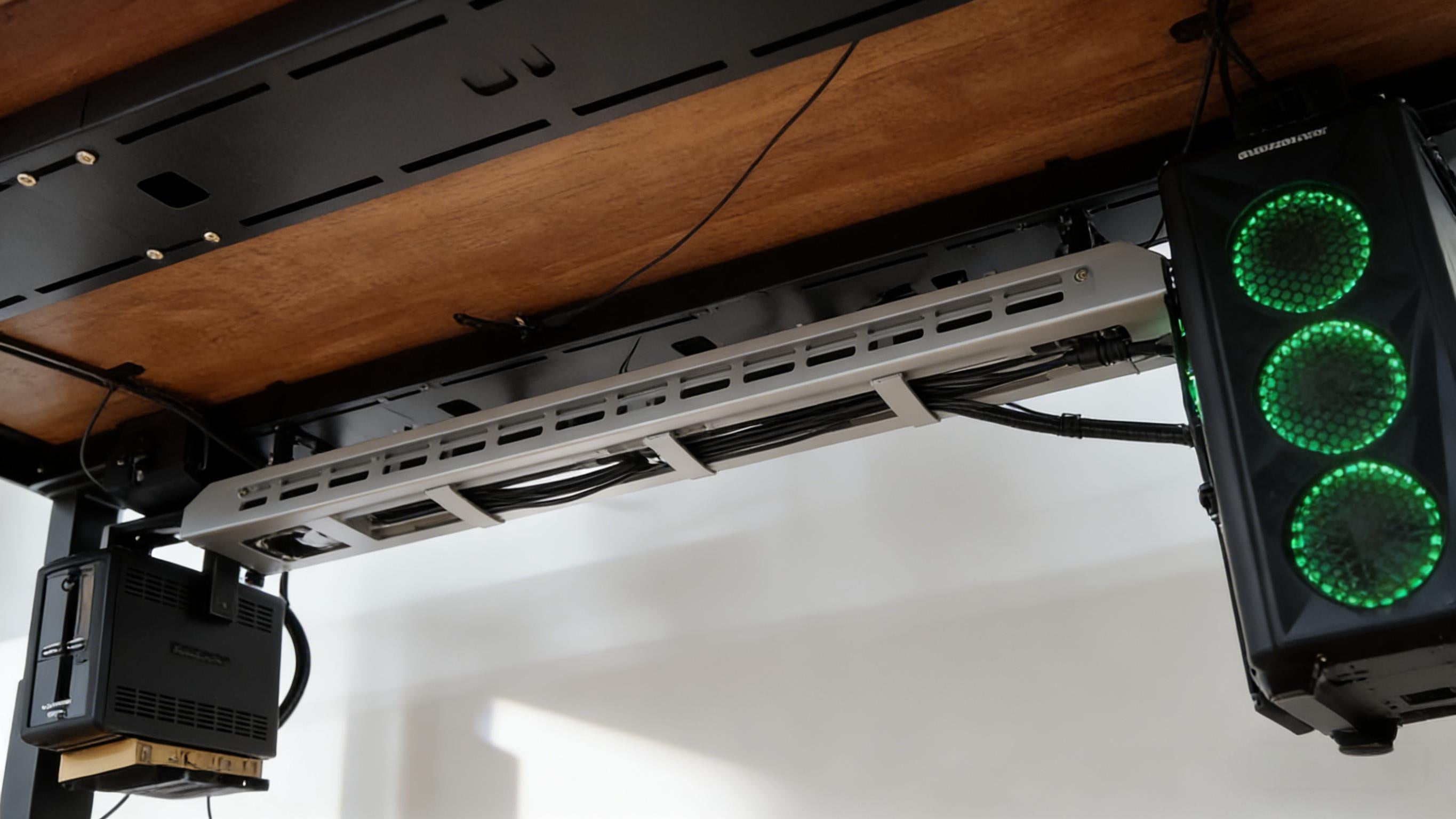 Clean home office desk with cables hidden underneath using no-drill cable management solutions